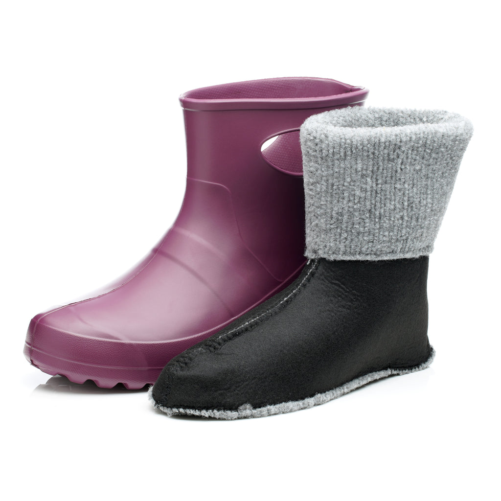Purple rubber boot with a black and gray sock on a white background